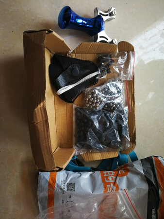 弹弓收到了后，打开看起来还不错，用泥凡试了试还行。