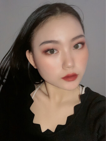 从红毛变成黑毛了