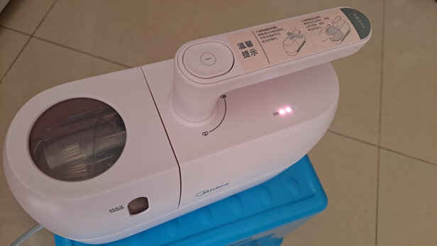 %title插图%num 美的(Midea)除螨仪B5J 无线手持床上家用吸尘 小粉盒 紫外线杀菌除螨