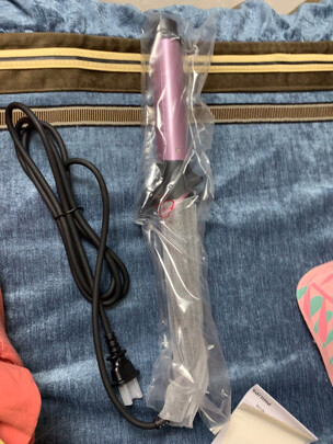 卷/直发器