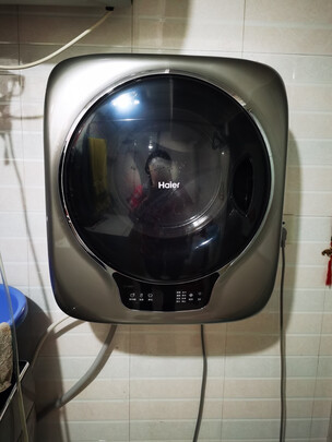 海尔滚筒洗衣机出现e1