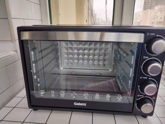 格兰仕烤箱门弹簧坏了怎么换图解 - 乐器教程网