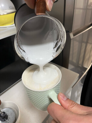 打奶器