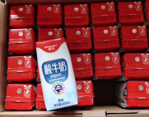 三,光明纯奶牛奶网友对比评测