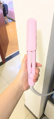 卷/直发器
