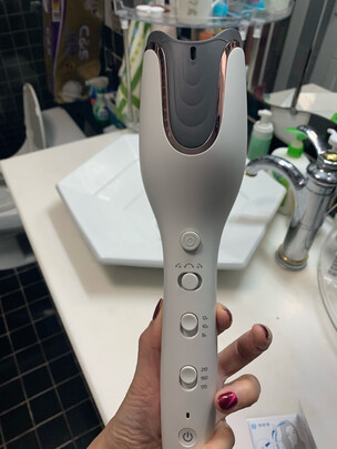 卷/直发器