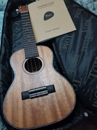 tom:"买尤克里里的想法有一段时间了,网上什么价格的都有,从*到上千