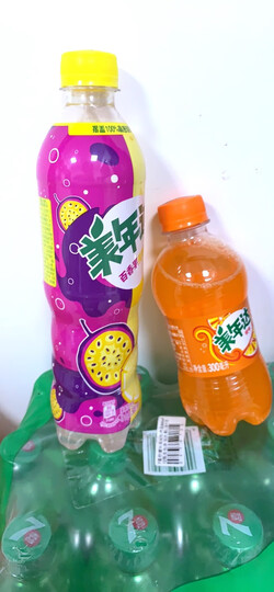 百事可乐美年达 果味型汽水 百香果菠萝味 500ml*12瓶:"口感还行.