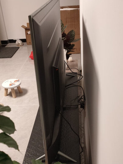 小米(mi)l65m5-es:"外形外观:全面屏,外边框小,65寸,主流的电视屏幕