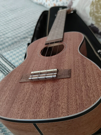 tom23寸桃花芯joy-m2京东定制款:"音质很正,做工细腻,琴弦软有助小