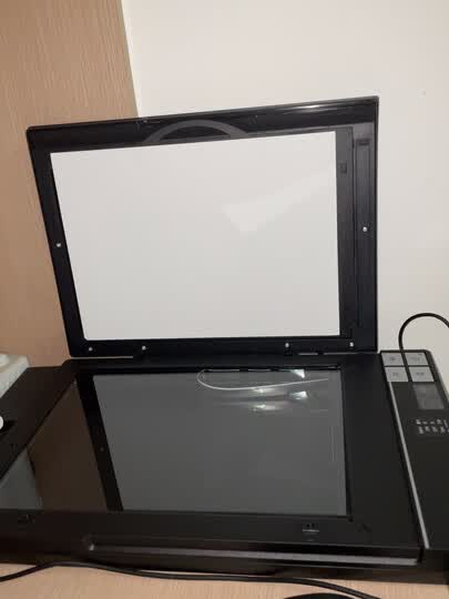 爱普生(epson):"买来给母亲到老照片的,一开始担心像以前的扫描仪一样