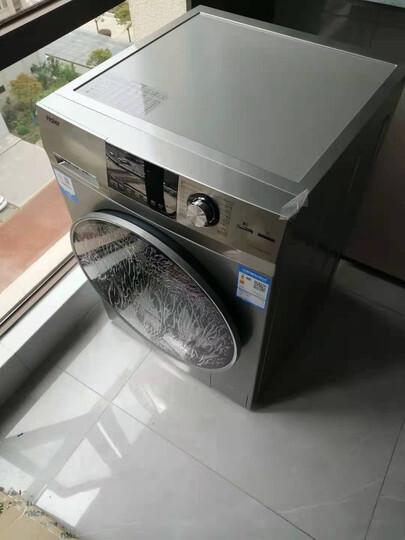 haier/海尔10公斤 直驱变频洗烘一体滚筒洗衣机全自动智能投放 eg100