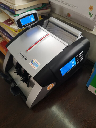 这是一款时尚美观实用的点钞机!