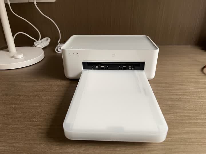小米小米米家照片打印机1s zpdyj03ht:"打印机很精致,体积小巧,做工不