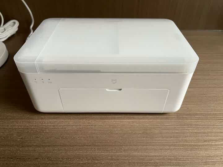 小米小米米家照片打印机1s zpdyj03ht:"打印机很精致,体积小巧,做工不