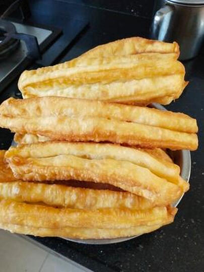 油条吃起来没够干脆.