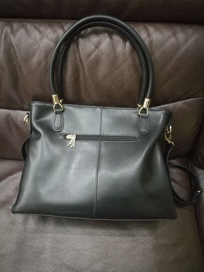 金狐狸(foxer):"包包已收到,老婆大人超喜欢,高端大气上档次!