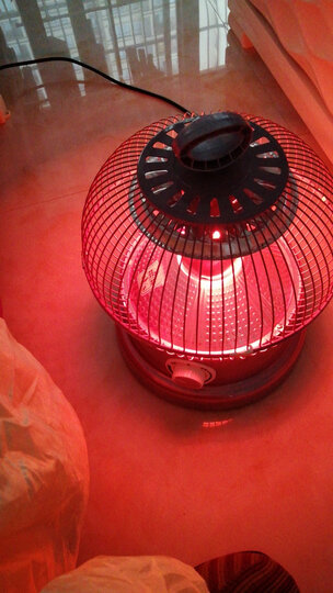 先菱 烤火炉鸟笼取暖器电暖炉烤脚五面快热炉 无极玫瑰金 晒单图