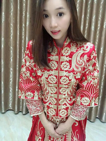 龙曼尼仕:"款式时尚大气袖子很有特色 很美 材质好做工精致 穿起来很