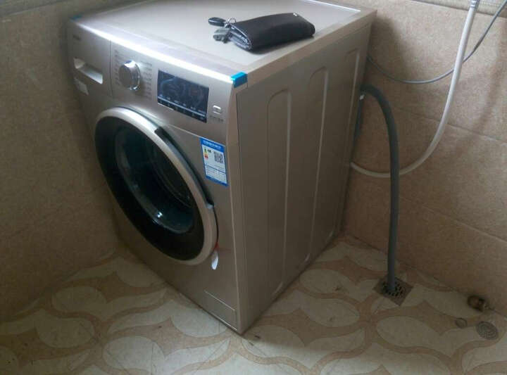 海尔eg10014b39gu1:"618抢购的洗衣机,6月20收到货,洗衣机两边壳有