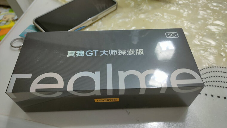 「买前须知」realme真我GT大师探索版与OPPO Reno6比较 哪款好？评测结果不看后悔