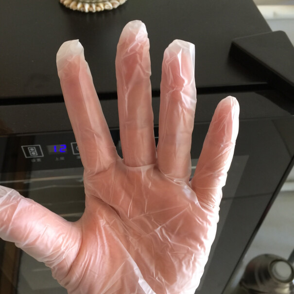 桂枫一次性pe手套加厚食品级塑料手套100只橡胶味道重吗？