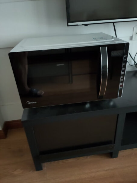 美的微烤一体机20升平板加热家用光波炉多功能微蒸烤箱请问解冻功能如何。会外面干吗？