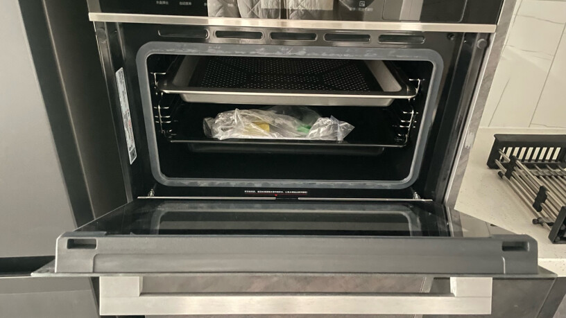 美的R3J嵌入式微蒸烤一体机APP智能操控微波炉蒸箱烤箱蒸十五分钟会有积水流机外吗？