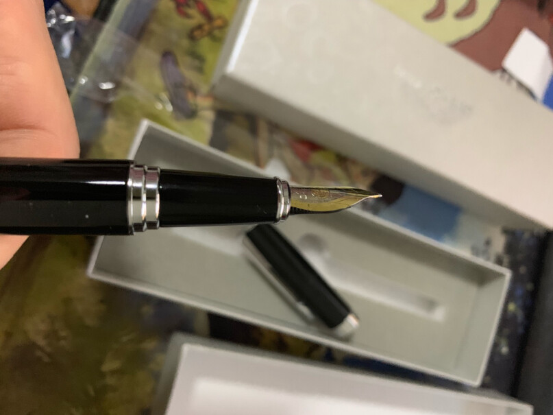 英雄钢笔382商务办公铱金钢笔签字笔为什么我感觉吸水器和笔头连接的地方比较松，总觉得随时会掉下来一样！