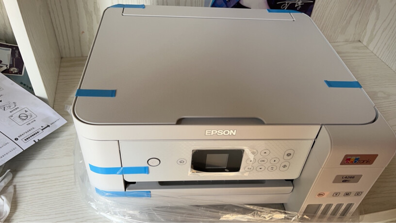 爱普生L4268墨仓式品质款彩色无线多功能一体机选用的6寸高光相纸，打印质量设置也是高质量，但打印出来的照片比较暗，如何解决啊？