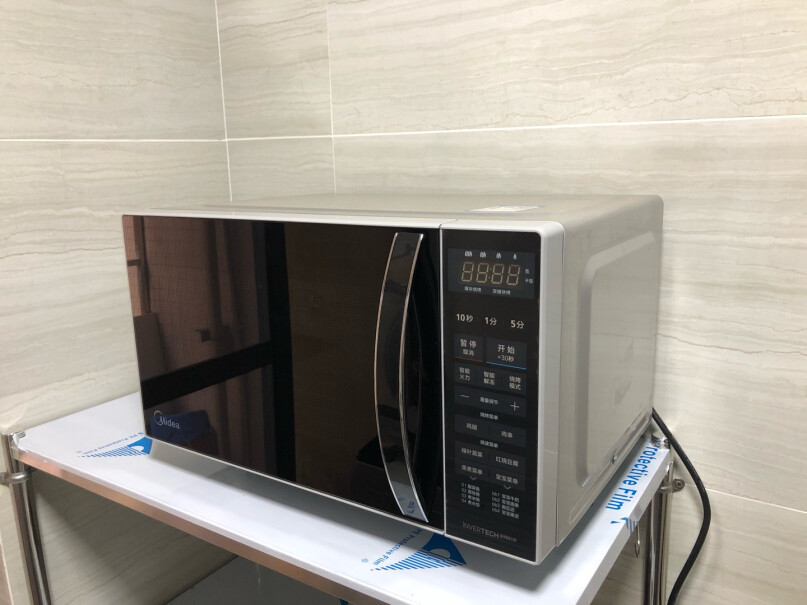 美的智能变频微波炉微波炉烤箱一体机用烧烤功能的时候后上面烫手，正常吗？