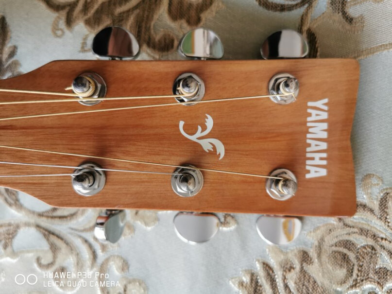 雅马哈F630民谣吉他雅马哈吉他这个琴包厚实吗？需要另外在买一个吗？