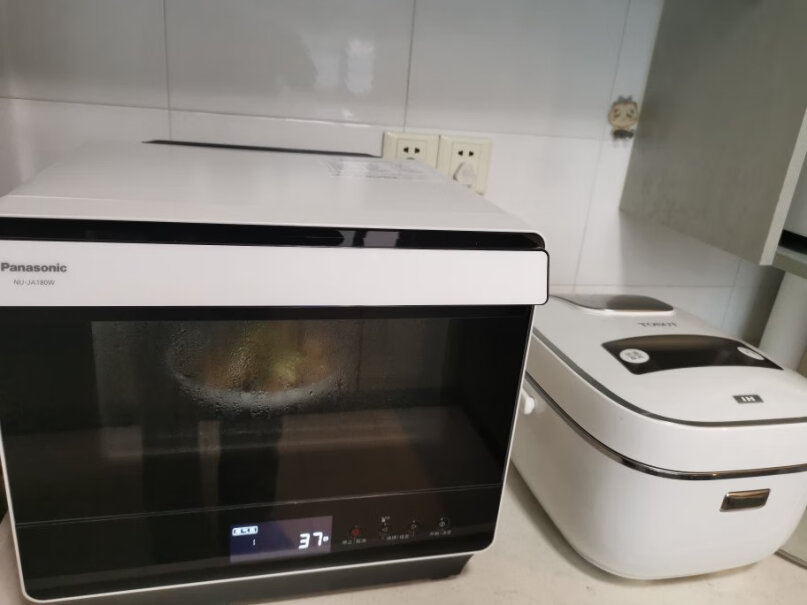 松下家用电烤箱多功能蒸烤箱一体机双层热风烘焙餐具消毒请问有微波炉的功能吗？