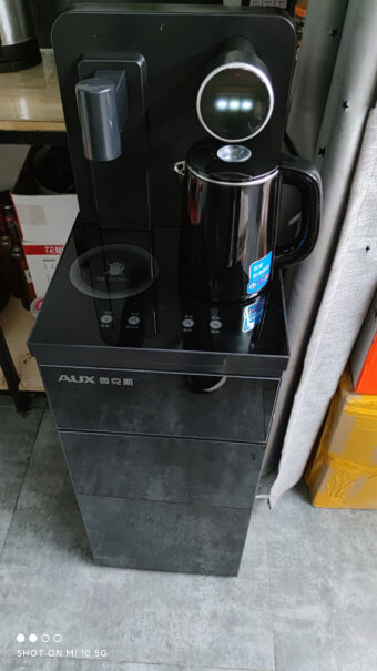 奥克斯茶吧机家用饮水机你们两边侧板是金属还是塑料，买回去才知道是塑料的？