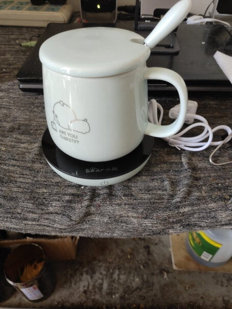 小熊陶瓷杯保温杯垫电热杯垫水杯恒温加热器刚从冰箱拿出来的牛奶大概要热多久才？