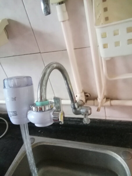 海尔HT101-1水龙头净水器台式净水机家用厨房过滤器自来水上档受骗的买下这个东西 ，就是不会安装 智商有限 ？