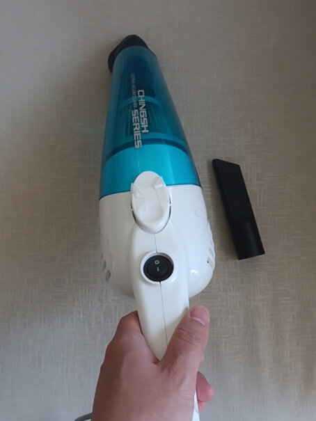 德尔玛DX1000吸尘器家用立式手持吸尘器湿头发能吸吗？