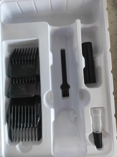 奥克斯成人理发器电推剪电动剃头刀剪发器充电怎么清洁刀头，怎么卸刀头。