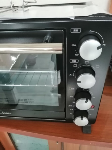 美的PT3501家用电烤箱请问考的时候冒烟吗？