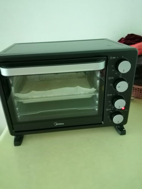 美的烤箱家用烘焙迷你小型电烤箱多功能台式蛋糕烤箱25L这个加热管怎么上面红下面不红啊，是本来就这样还是坏了啊？