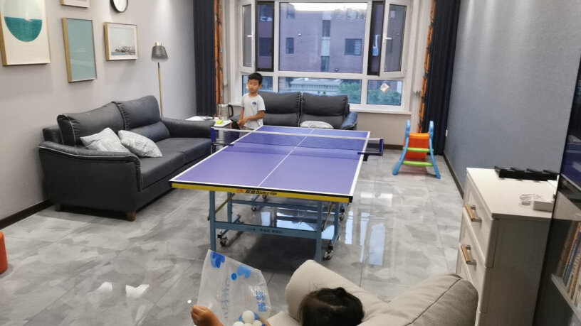 双鱼少年儿童乒乓球台这款乒乓球桌68高度，成人打施展得开吗？
