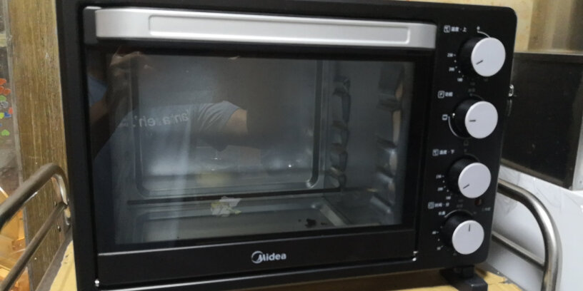 美的烤箱家用烘焙迷你小型电烤箱多功能台式蛋糕烤箱25L这可以拿来热菜吗？