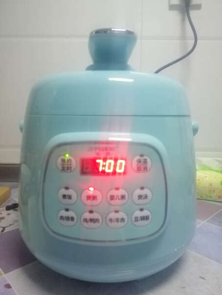 半球电压力锅电高压锅迷你2.5L小容量智能预约家用粘锅吗？