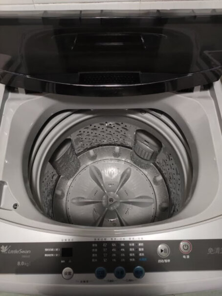 小天鹅10公斤变频波轮洗衣机全自动健康免清洗直驱变频一键脱水出水在左侧还是右侧？