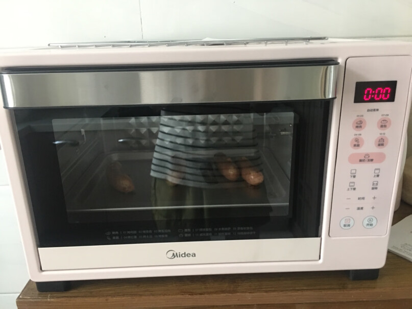 美的多功能烤箱上下四管独立控温烤的时候温度显示那里会一直闪烁吗？