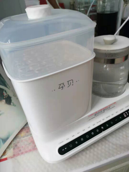 德国孕贝五合一恒温水壶温奶器恒温调奶器奶瓶消毒器这个消毒锅容易清洗吗？