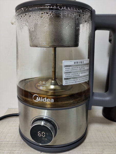 办公室烧水壶净润煮茶器大容量商务电水壶灰色的那款，烧水过程中，一直显示温度，还是显示温度和功能来回切换，比如45 01这样切换？