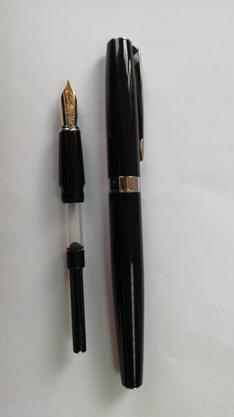 英雄钢笔382商务办公铱金钢笔签字笔这个钢笔能用墨囊吗，用哪一种？