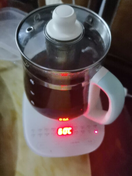 小熊茶壶水壶电热水壶1.5L电水壶煮茶药膳恒温拿起来倒水的时候会响几声啊？