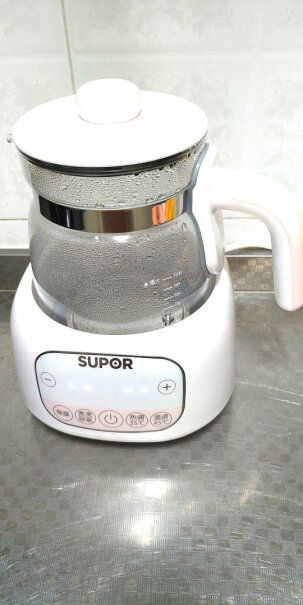 苏泊尔婴儿恒温暖奶器调奶器消毒器二合一怎么判断奶热好没有？热奶时水是不能超过里面的水位线么？